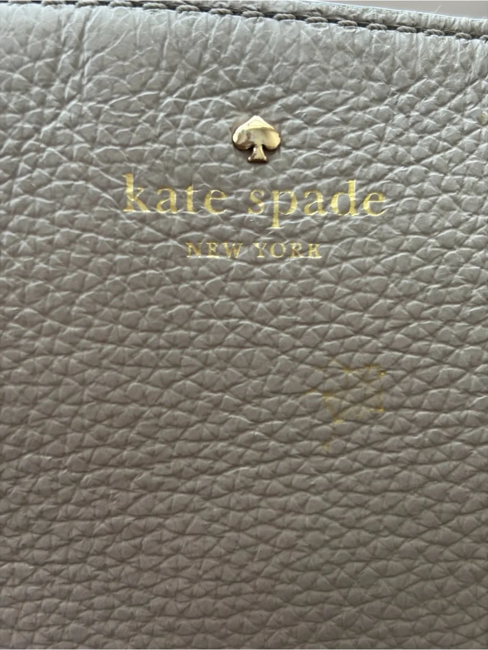 kate spade Gray Pebbled Leather Crossbody with Gold Hardware.